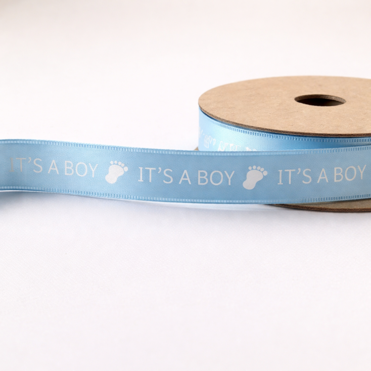 wstążka satynowa niebieska z białym nadrukiem IT'S A BOY 1.jpg.png